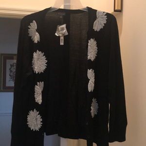 The Limited Black Sweater with White Details!